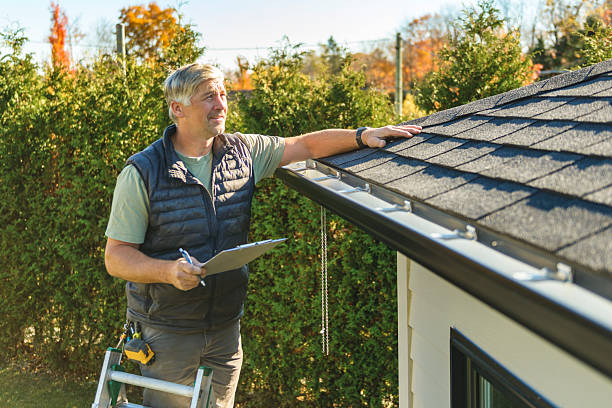 Professional Roofing technician working in Tow, TX